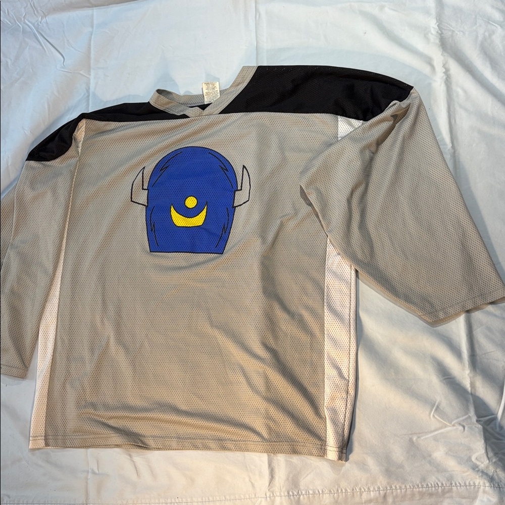 AK (athletics knitwear $made in Canada hokey jersey blue yellow character No 3